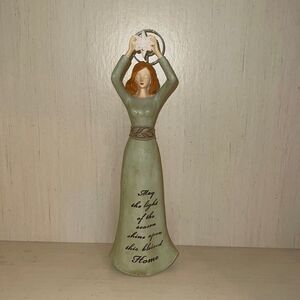 Pretty ceramic angel holding a star! With inspirational script .10” tall